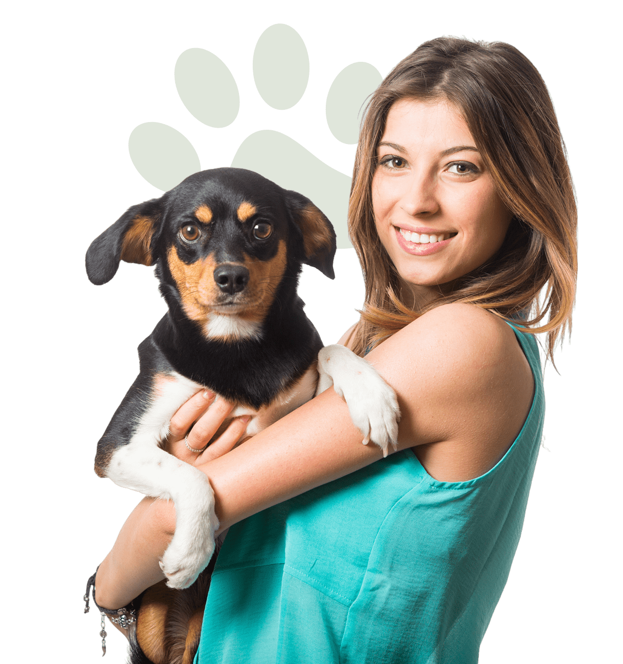 Woman holding a small black and tan dog.